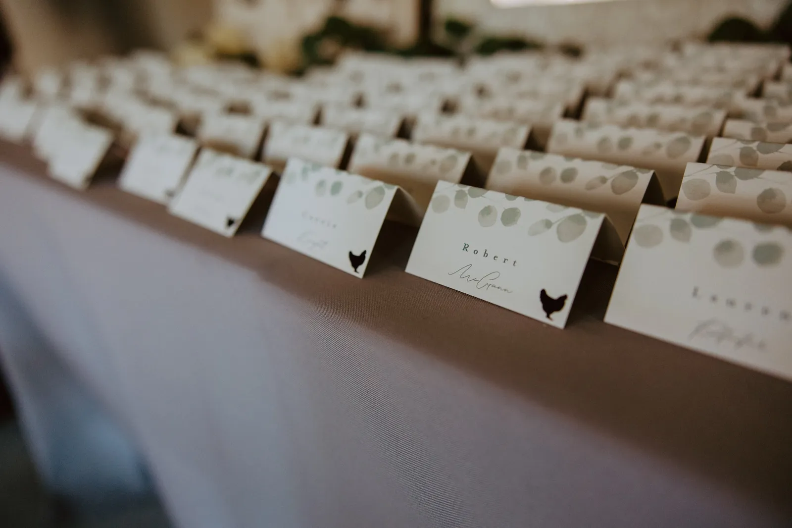 Rows of place cards on a table